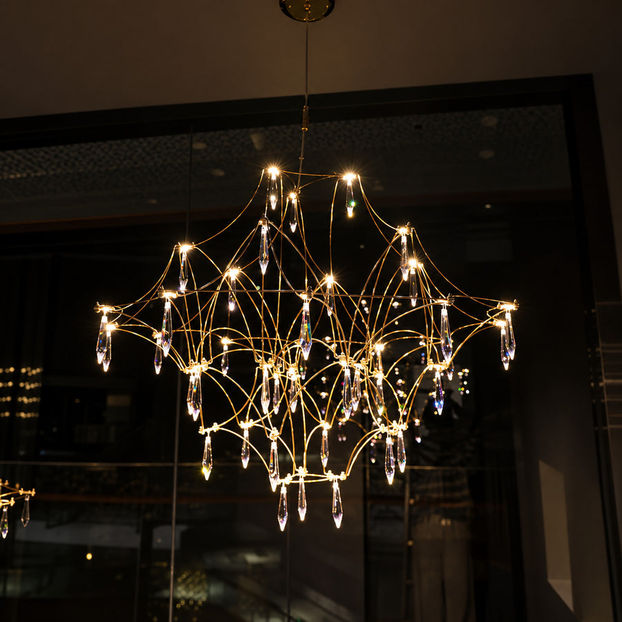 Detail of the geometric stainless steel wire frame of the Astra crystal chandelier