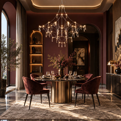 Astra crystal chandelier casting warm sparkling light over an elegant dining room table