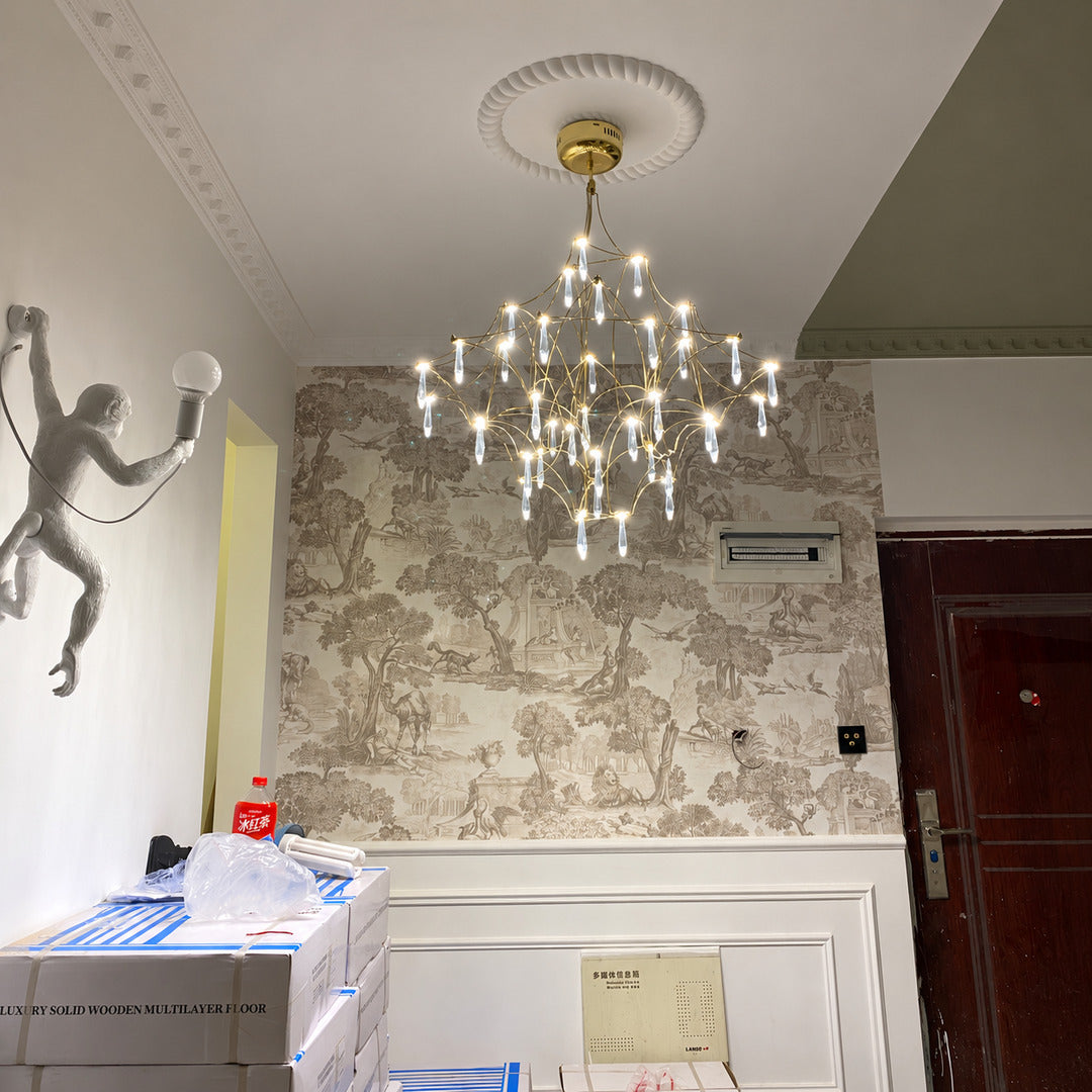 Astra crystal chandelier as a glamorous sculptural centerpiece in a modern living room
