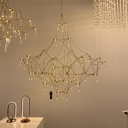 Silver Astra crystal chandelier highlighting a high-end retail showroom