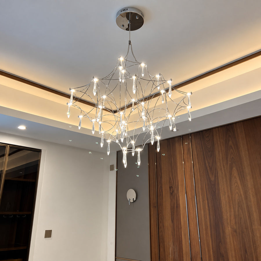 Close-up of the teardrop crystals hanging from the wire frame of the Astra crystal chandelier