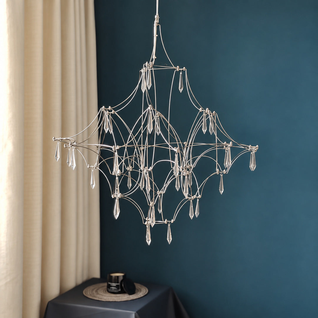 Close-up of the teardrop crystals hanging from the wire frame of the Astra crystal chandelier