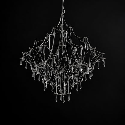 Small 23.6-inch silver Astra crystal chandelier in a modern bedroom