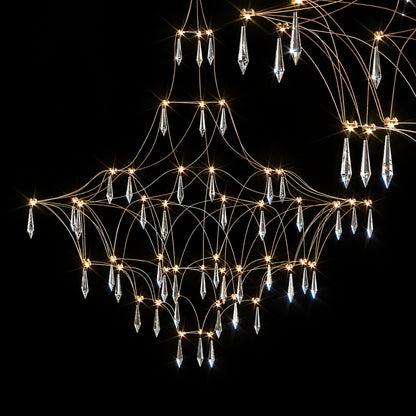 Detail of the geometric stainless steel wire frame of the Astra crystal chandelier
