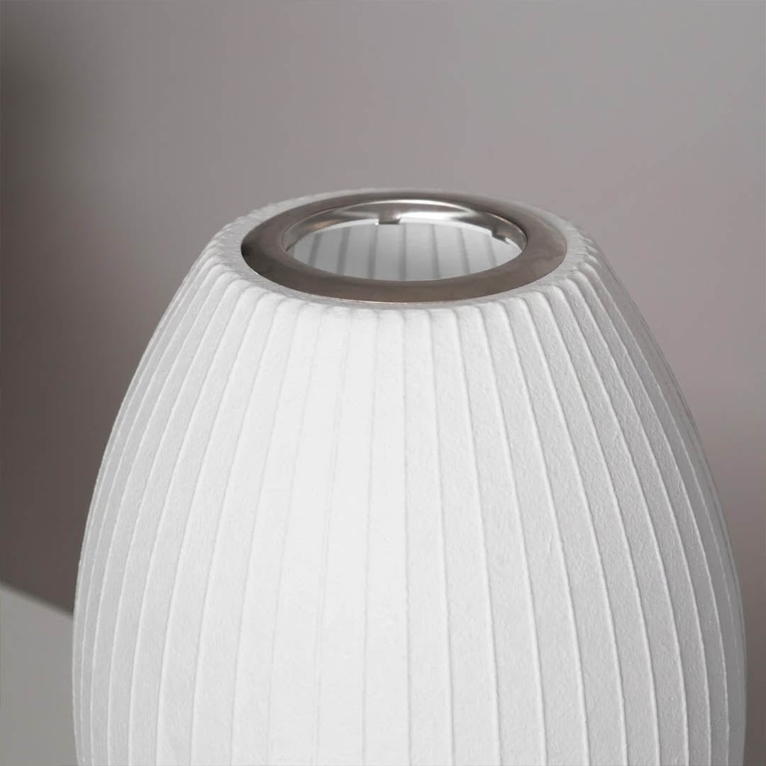 Astrid silk shade close up illuminated warm soft amber glow diffuse light Japandi Wabi Sabi quality material