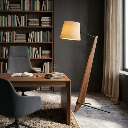 Atlas tall floor lamp beside sofa living room warm glow showing large scale modern interior