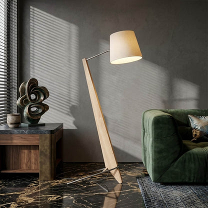Atlas tall floor lamp beside sofa living room warm glow showing large scale modern interior