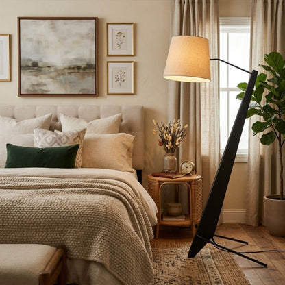 Atlas tall floor lamp beside sofa living room warm glow showing large scale modern interior