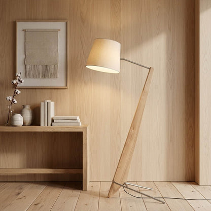 Atlas tall floor lamp beside sofa living room warm glow showing large scale modern interior
