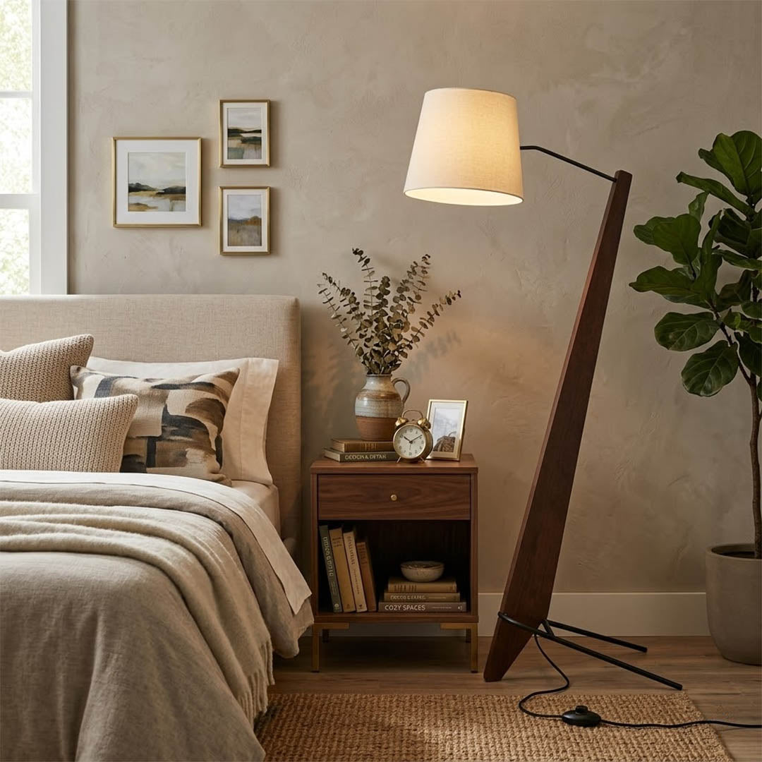 Atlas tall floor lamp beside sofa living room warm glow showing large scale modern interior