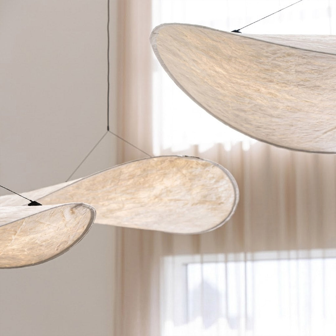 Aura disc pendant side view flat thin profile only 4.7 to 7 inches tall height comparison demonstrate low ceiling friendly