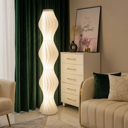 Aureli white wave LED floor lamp with sculptural acrylic shade by Stuberlighting