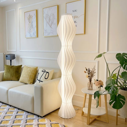 Aureli white wave LED floor lamp with sculptural acrylic shade by Stuberlighting