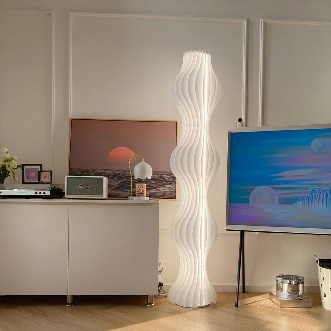 Aureli white wave LED floor lamp with sculptural acrylic shade by Stuberlighting