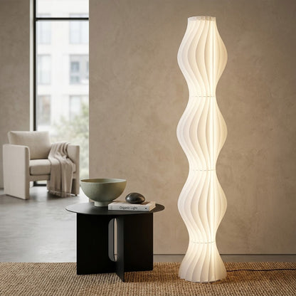 Aureli white wave LED floor lamp with sculptural acrylic shade by Stuberlighting