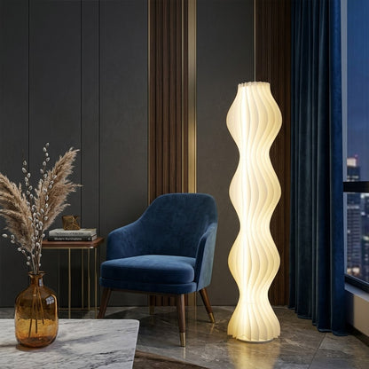 Aureli white wave LED floor lamp with sculptural acrylic shade by Stuberlighting