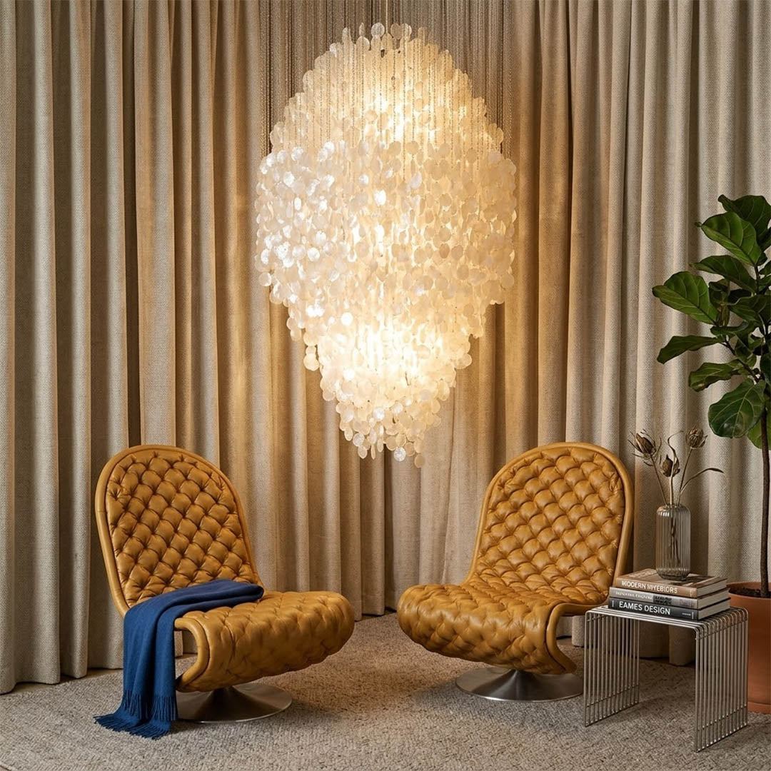 Aurelia 7DM FUN style grand cascade shell chandelier vaulted living room 16 ft ceiling grand mansion Coastal Mid Century designer warm glow lifestyle interior