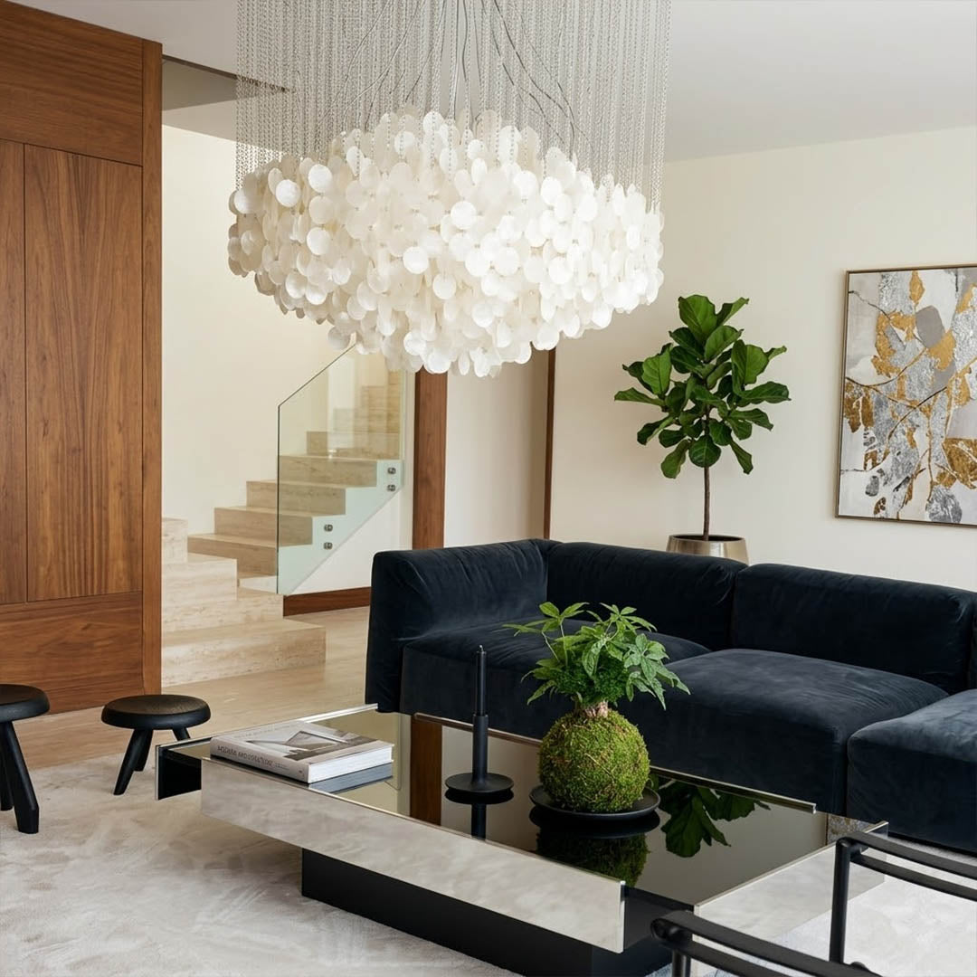 Aurelia 7DM FUN style grand cascade shell chandelier vaulted living room 16 ft ceiling grand mansion Coastal Mid Century designer warm glow lifestyle interior
