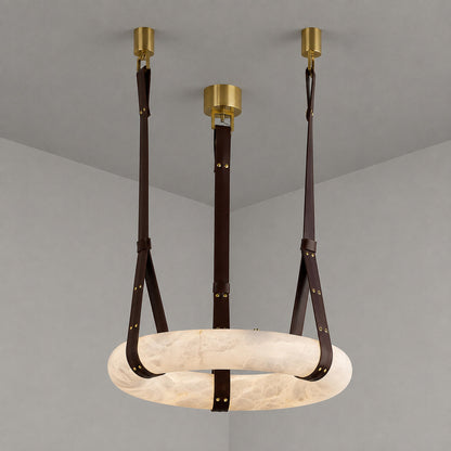 Model A Aureo alabaster pendant light with a dark brown strap in a modern dining room