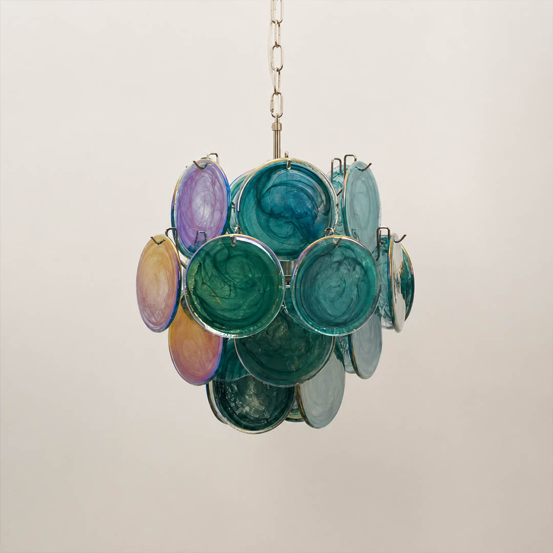 Aurora iridescent disc Murano glass chandelier 18 inch deep blue ocean nickel silver frame hand blown Italian layered swirling pigment kaleidoscopic modern coastal sculptural white background