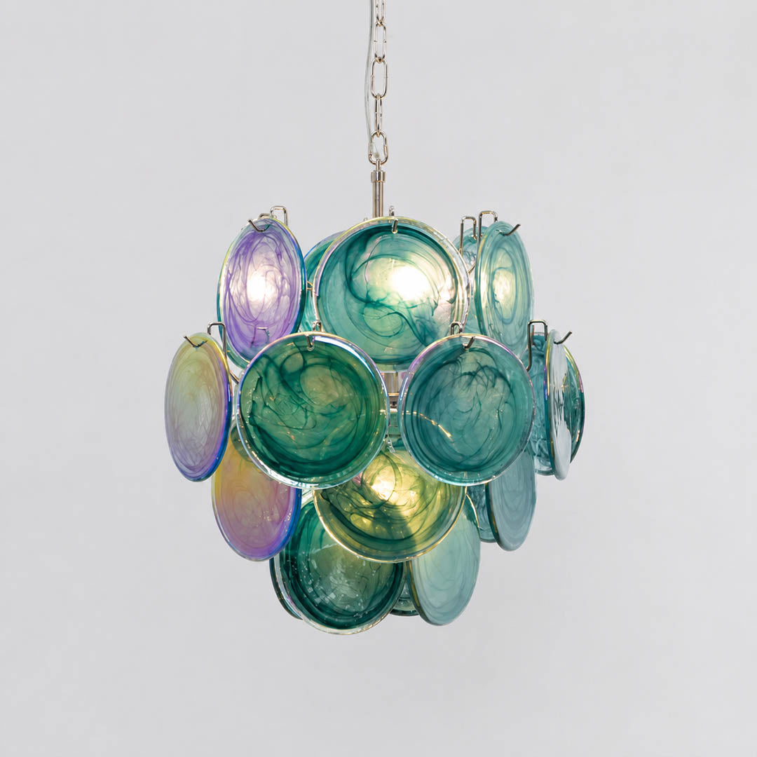 Aurora iridescent disc Murano glass chandelier 18 inch deep blue ocean nickel silver frame hand blown Italian layered swirling pigment kaleidoscopic modern coastal sculptural white background