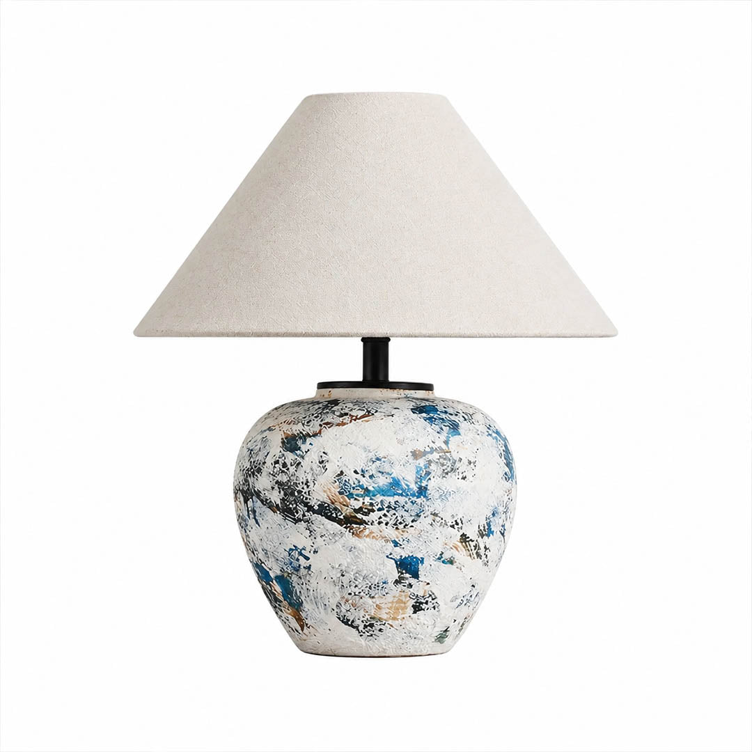 Azzurro ceramic table lamp hand glazed blue white swirl base beige fabric shade gold hardware neoclassical white background front view