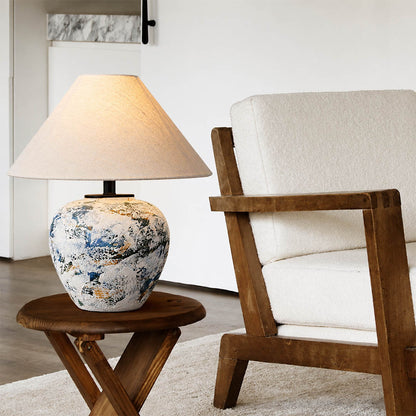 Azzurro ceramic table lamp living room side table beside white sofa blue white ceramic warm glow neoclassical American home lifestyle interior