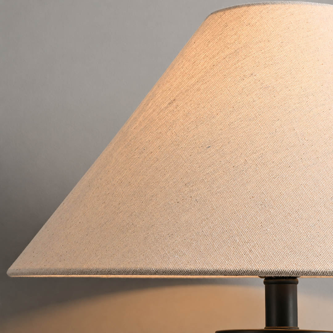 Azzurro ceramic table lamp beige fabric shade warm soft diffused ambient glow cozy detail close up