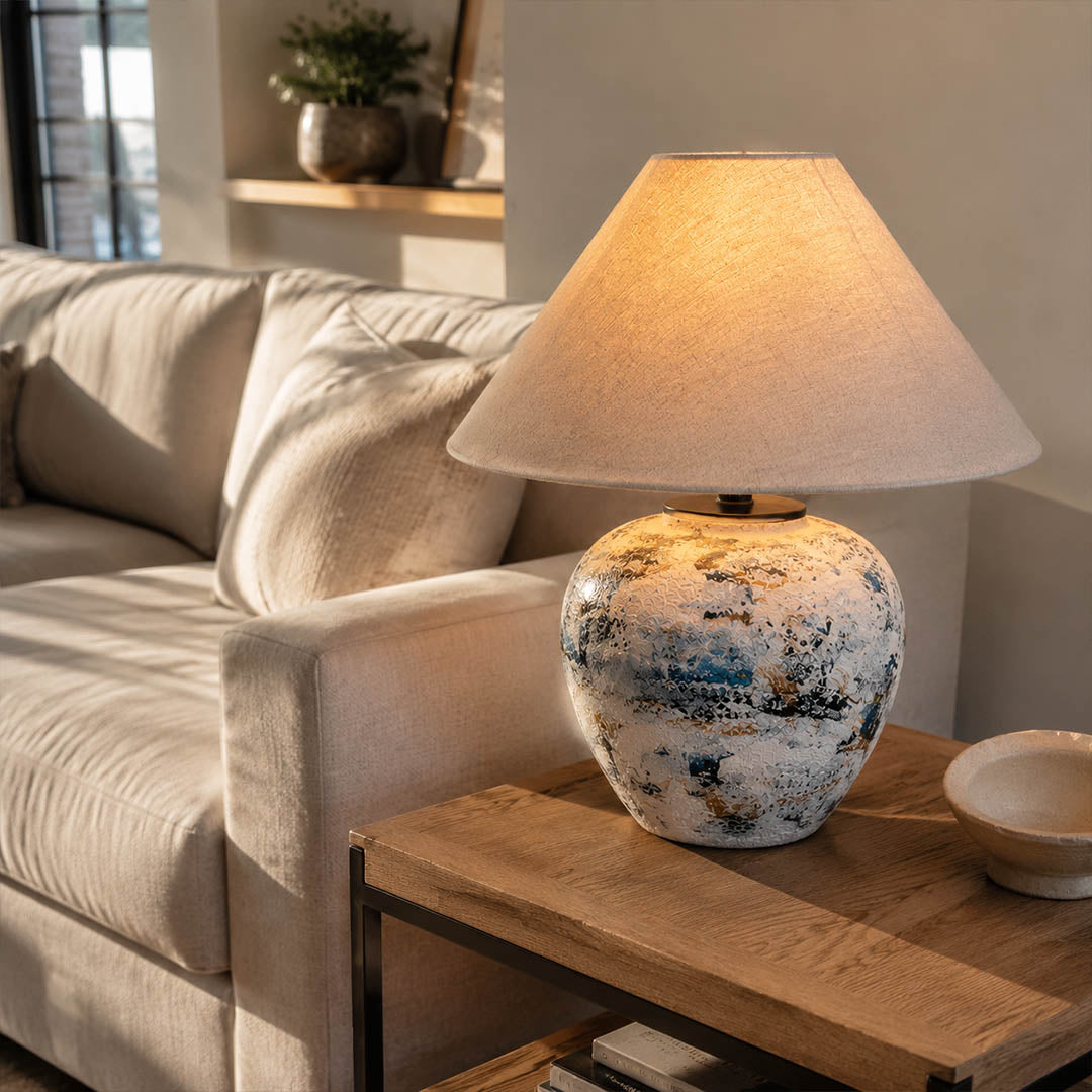 Azzurro ceramic table lamp living room side table beside white sofa blue white ceramic warm glow neoclassical American home lifestyle interior