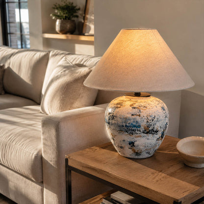 Azzurro ceramic table lamp living room side table beside white sofa blue white ceramic warm glow neoclassical American home lifestyle interior