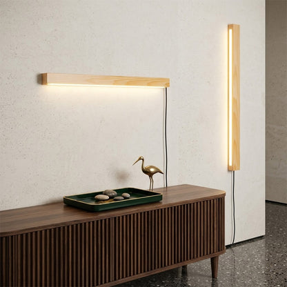 Beam wood linear LED wall light above bed headboard bedroom warm light japandi interior