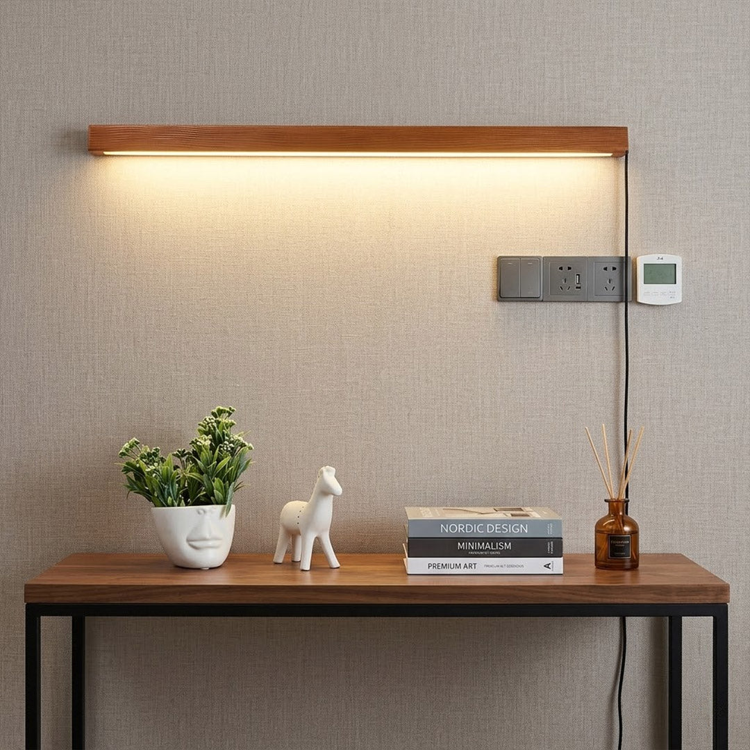 Beam wood linear LED wall light above bed headboard bedroom warm light japandi interior