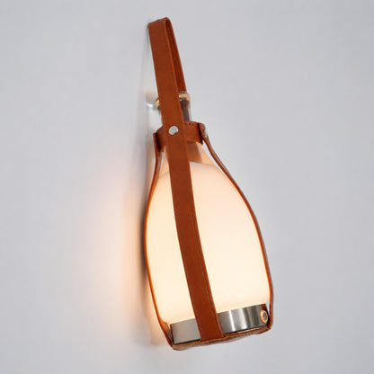 Belle portable table lamp glass shade warm diffused glow soft light detail close up