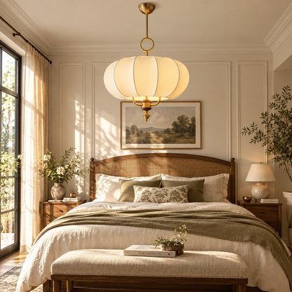 Belle lantern pendant adding a soft warm glow above a bedroom