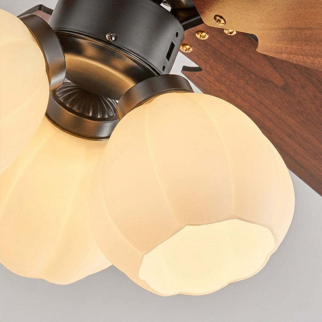 Belora flower shaped frosted glass shade and solid wood blade close up detail
