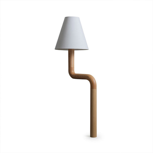 Modern bent wood table lamp with warm ambient LED lighting by Stuberlighting