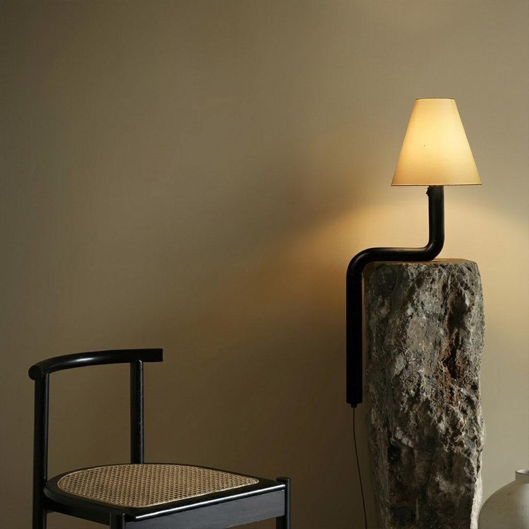 Modern bent wood table lamp with warm ambient LED lighting by Stuberlighting