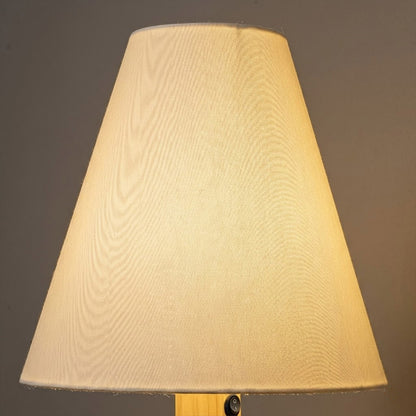 Modern bent wood table lamp with warm ambient LED lighting by Stuberlighting