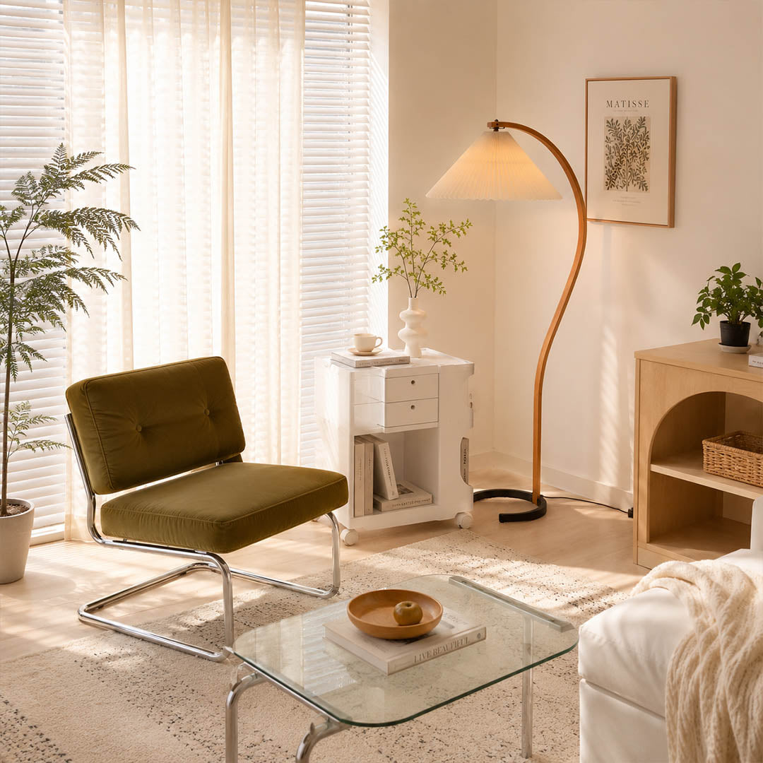 Bendik floor lamp beech wood beige linen shade reading corner armchair book cozy Scandinavian modern warm ambient sculptural Danish lifestyle interior