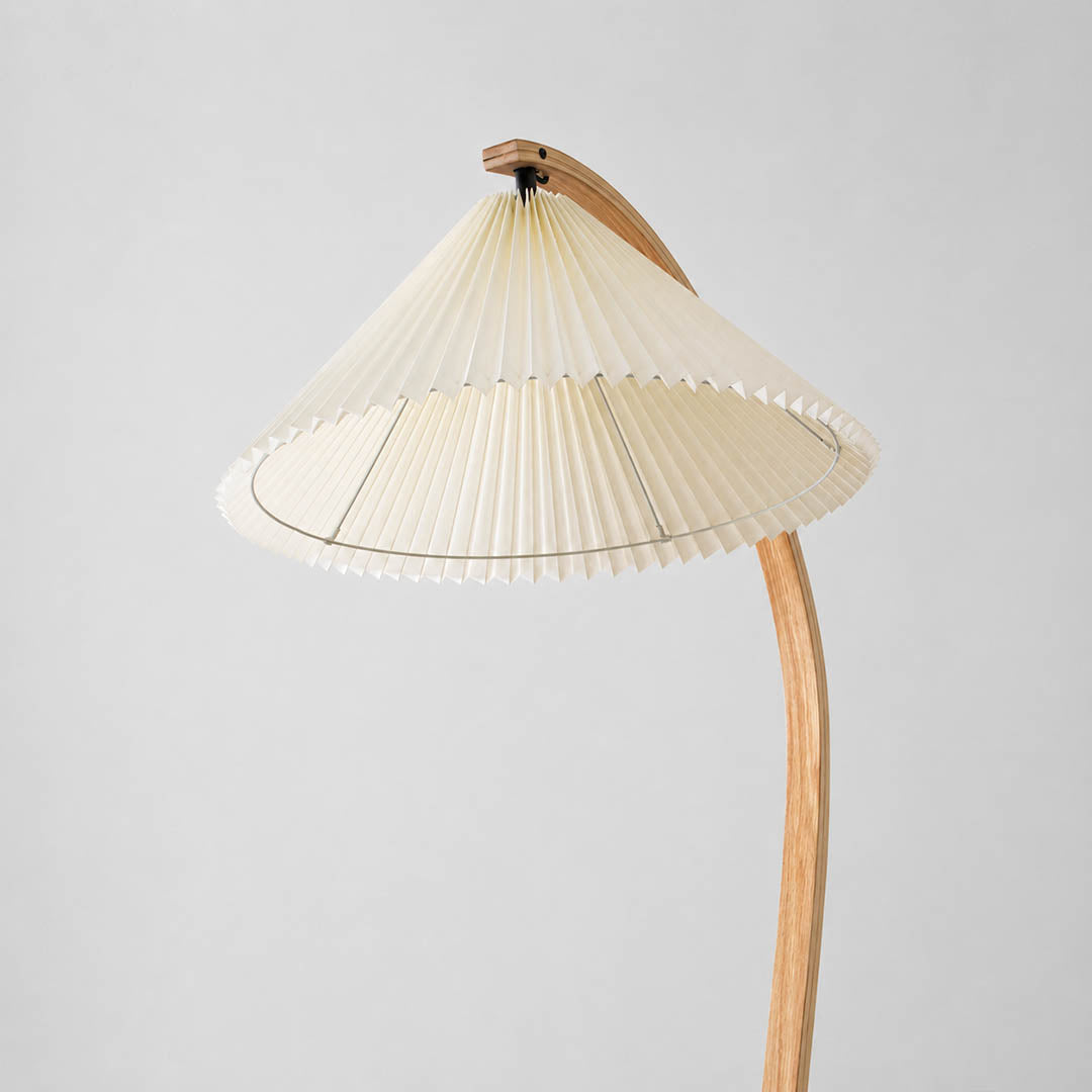 Bendik floor lamp beech wood natural grain texture organic material warm neutral finish detail close up craftsmanship Scandinavian