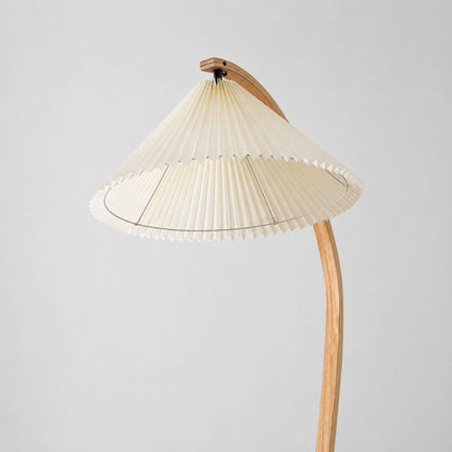 Bendik floor lamp beech wood natural grain texture organic material warm neutral finish detail close up craftsmanship Scandinavian
