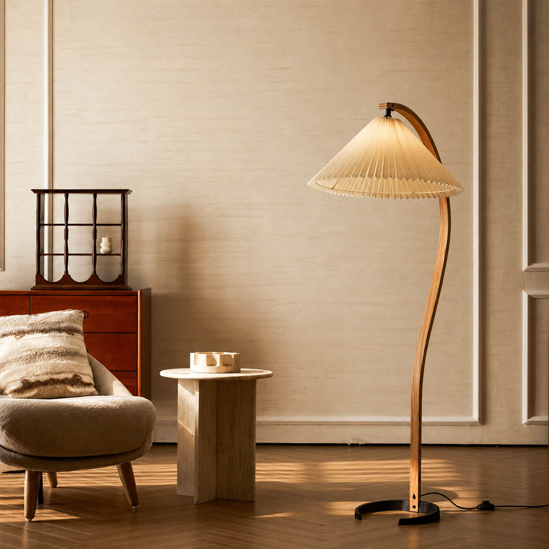 Bendik floor lamp beech wood beige linen shade reading corner armchair book cozy Scandinavian modern warm ambient sculptural Danish lifestyle interior