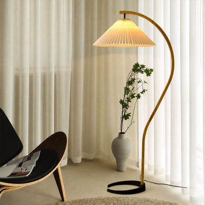 Bendik floor lamp beech wood beige linen shade reading corner armchair book cozy Scandinavian modern warm ambient sculptural Danish lifestyle interior