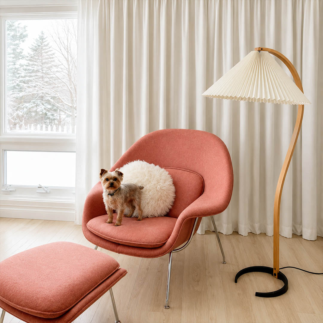 Bendik floor lamp beech wood beige linen shade reading corner armchair book cozy Scandinavian modern warm ambient sculptural Danish lifestyle interior