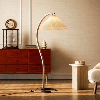Bendik floor lamp beech wood beige linen shade reading corner armchair book cozy Scandinavian modern warm ambient sculptural Danish lifestyle interior