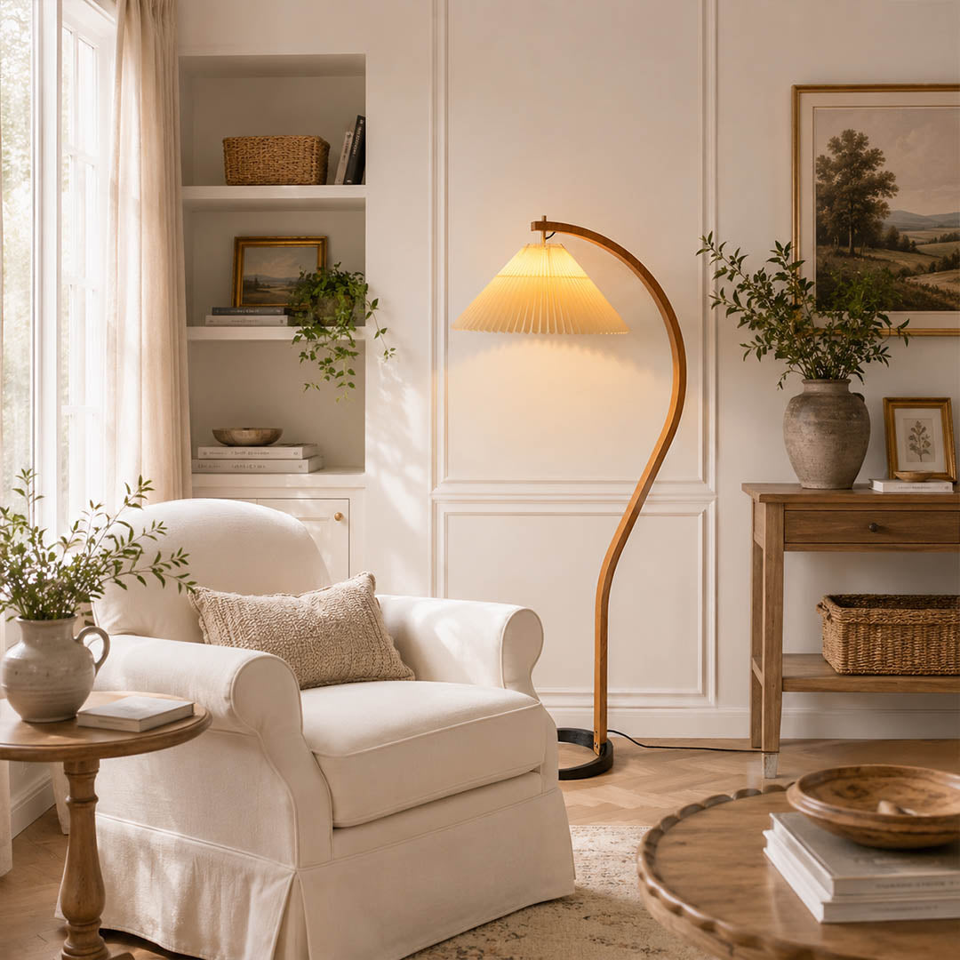 Bendik floor lamp beech wood beige linen shade reading corner armchair book cozy Scandinavian modern warm ambient sculptural Danish lifestyle interior