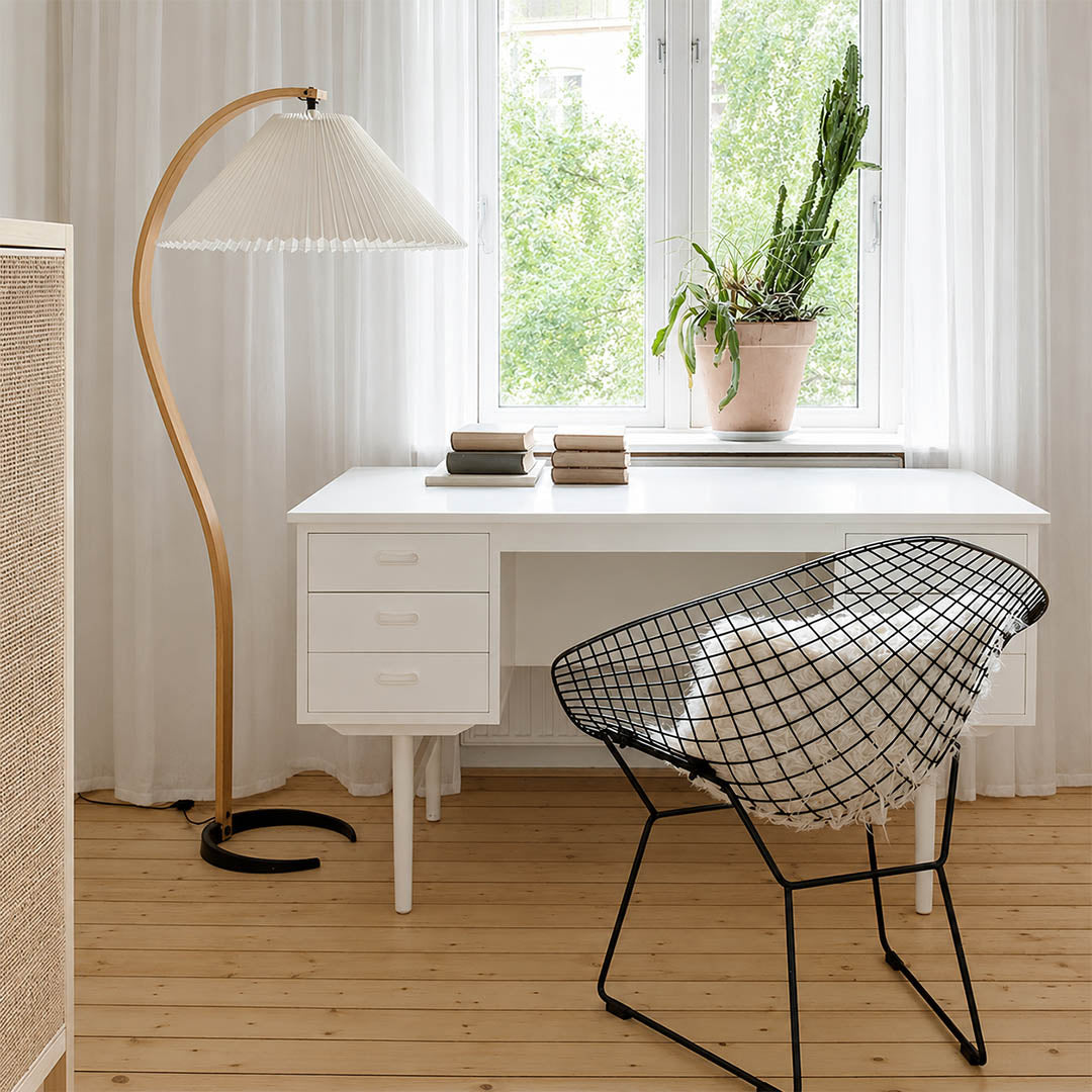 Bendik floor lamp beech wood white linen shade home office corner modern minimalist warm ambient sculptural functional Danish lifestyle interior