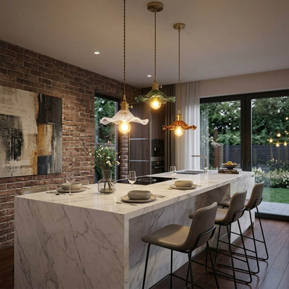 Bloom glass flower pendant lights cluster above kitchen island warm glow interior
