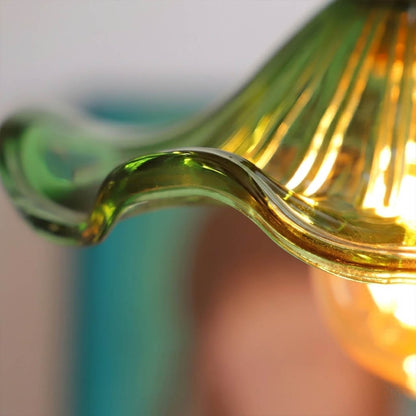 Bloom glass flower pendant light petal shaped shade brass detail close up