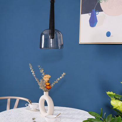 Bolla glass pendant light dining table bar top illuminated warm glow glass leather strap American home lifestyle interior styled
